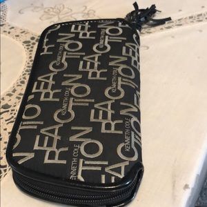 Used checkbook wallet by Kenneth Cole